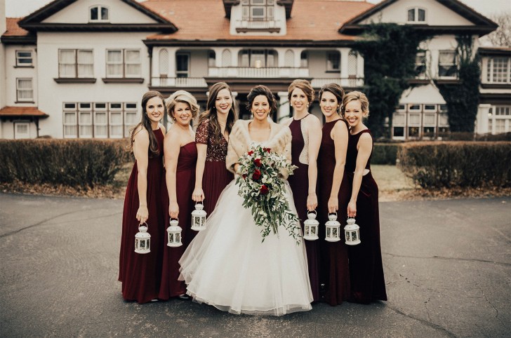 best Christmas wedding ideas on a budget bridesmaids holding lanterns